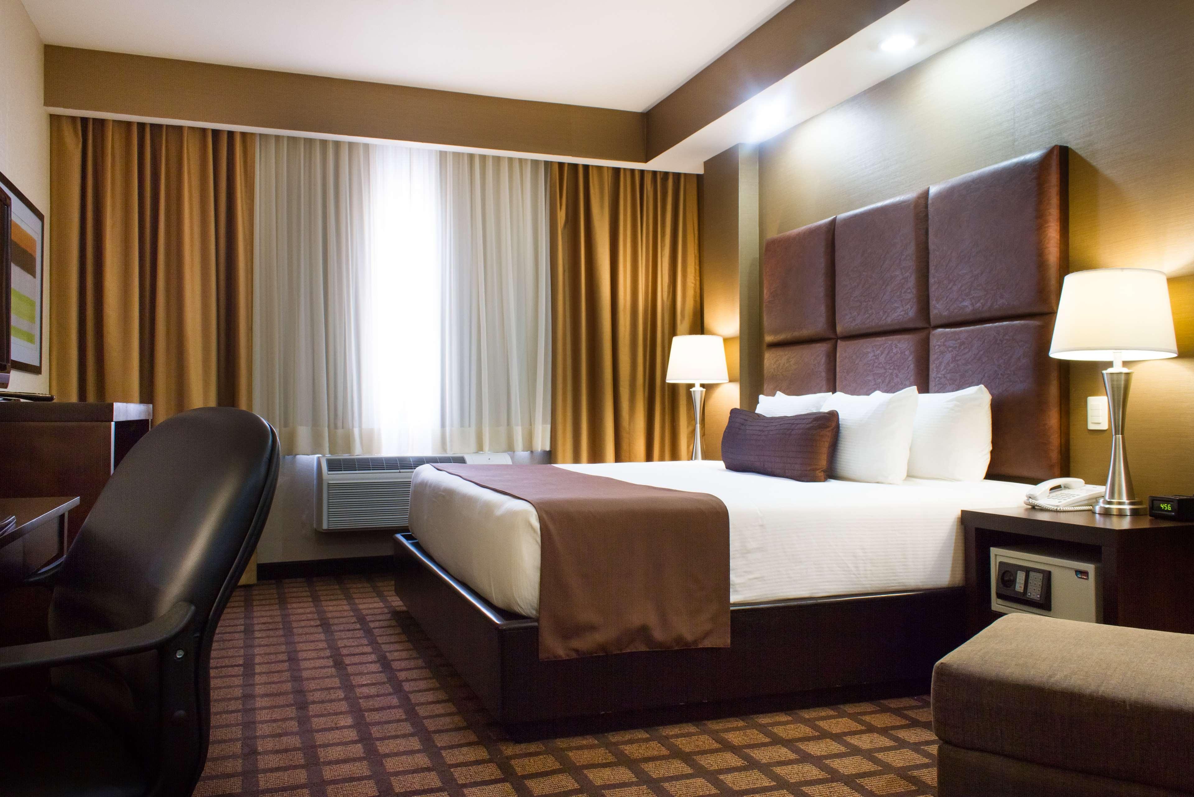Best Western Premier Monterrey Aeropuerto Apodaca Extérieur photo A typical room at the hotel